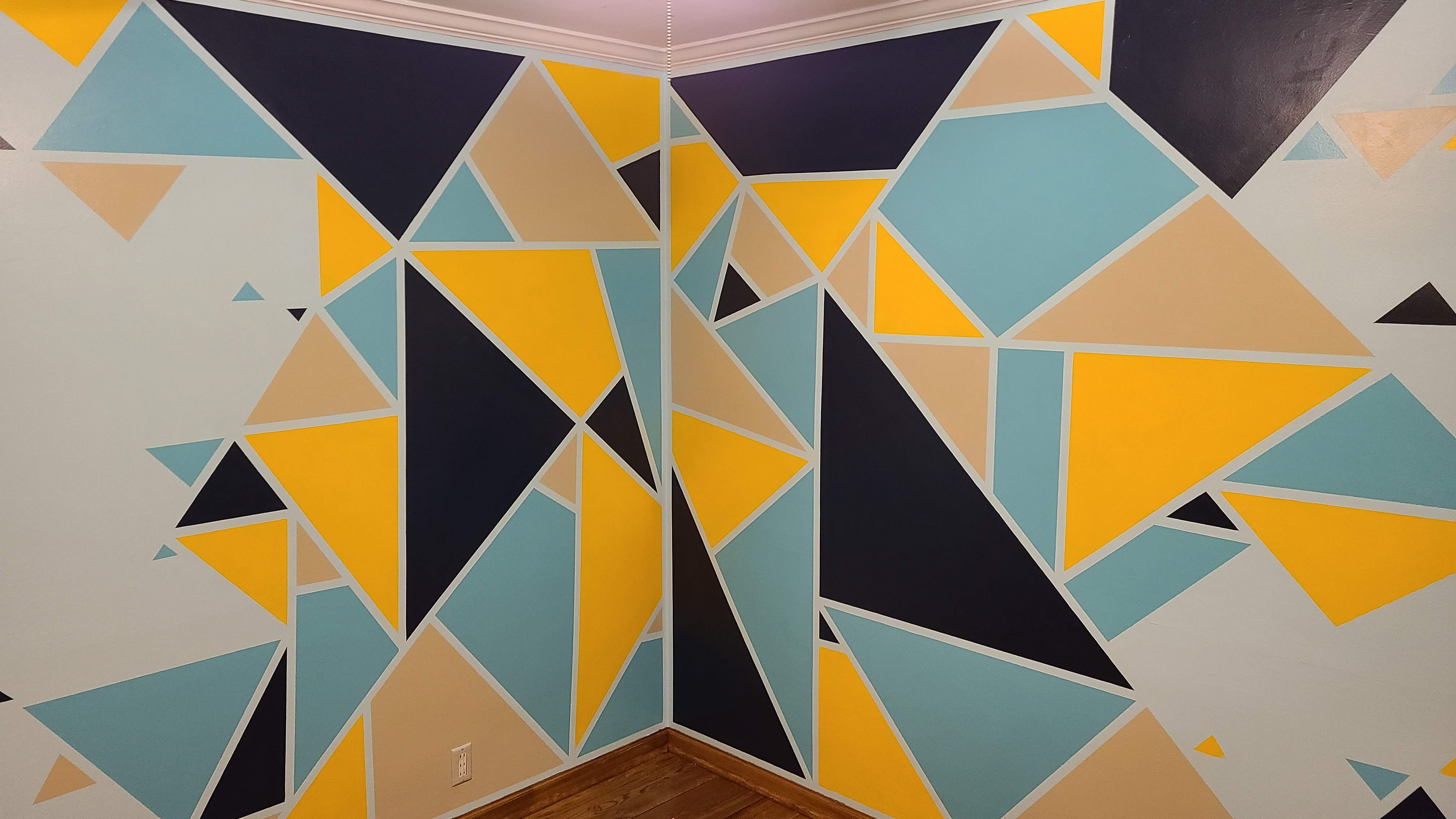 A photo of a painted accent wall Megan made in henry's room.